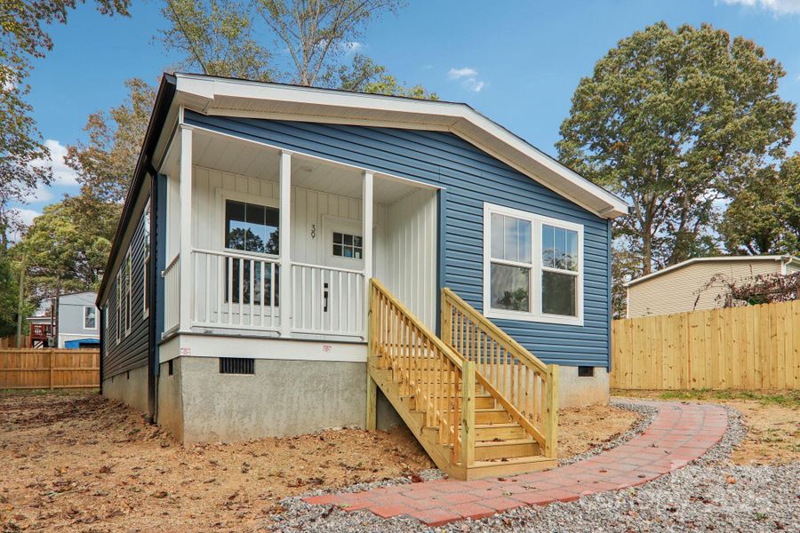 Exterior details and patio area of a home in , Asheville (Image 2). Exterior details and patio area of a home in , Asheville (Image 2).