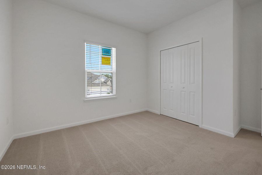 Spacious, unfurnished interior of a new home in Brook Forest, St. Augustine (Image 21).