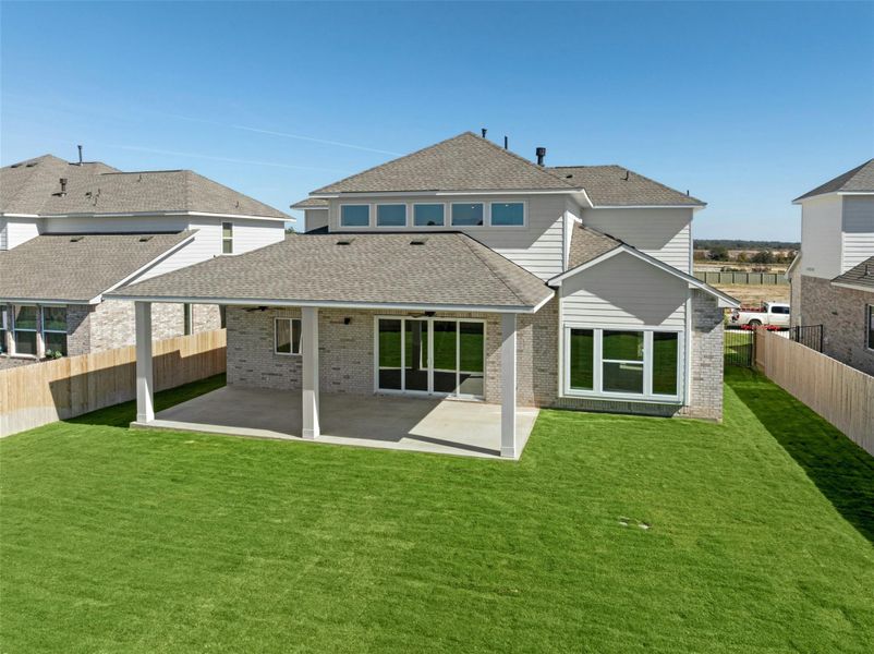 Exterior details and patio area of a home in Santa Rita Ranch, Liberty Hill (Image 24).