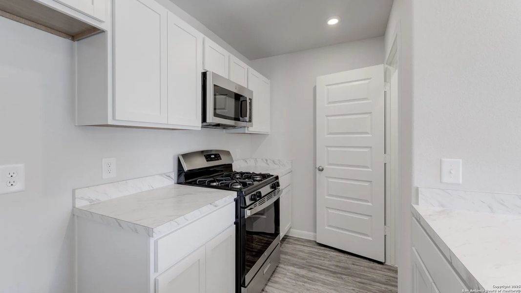 Furnished interior view inside a new home in Las Colinas, Kenedy (Image 4). Furnished interior view inside a new home in Las Colinas, Kenedy (Image 4).