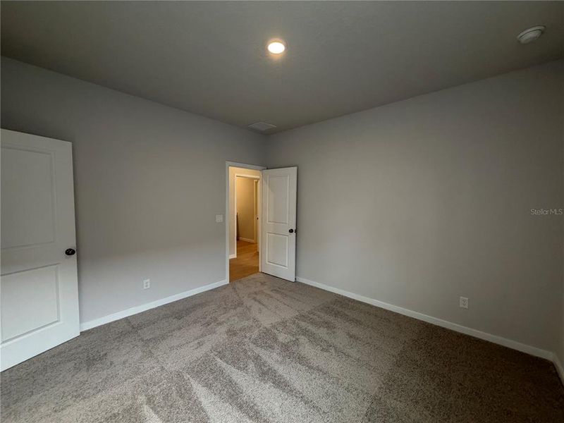Spacious, unfurnished interior of a new home in The Magnolia Series at Reserve East, Flagler Beach (Image 27). Spacious, unfurnished interior of a new home in The Magnolia Series at Reserve East, Flagler Beach (Image 27).