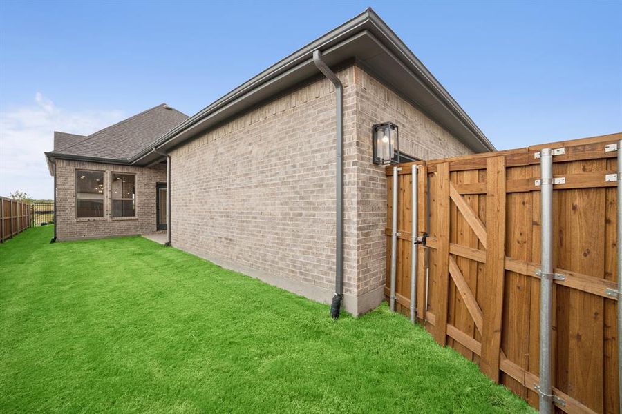 Exterior details and patio area of a home in Talia – Garden Series, Mesquite (Image 3). Exterior details and patio area of a home in Talia – Garden Series, Mesquite (Image 3).