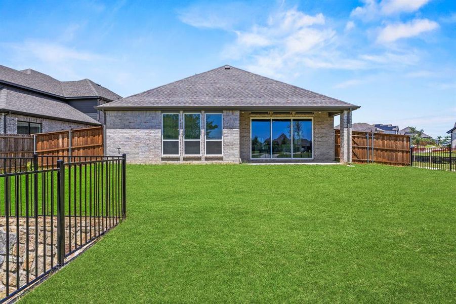 Exterior details and patio area of a home in , Little Elm (Image 3). Exterior details and patio area of a home in , Little Elm (Image 3).