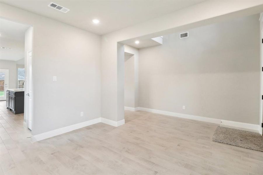 Spare room featuring light hardwood / wood-style floors