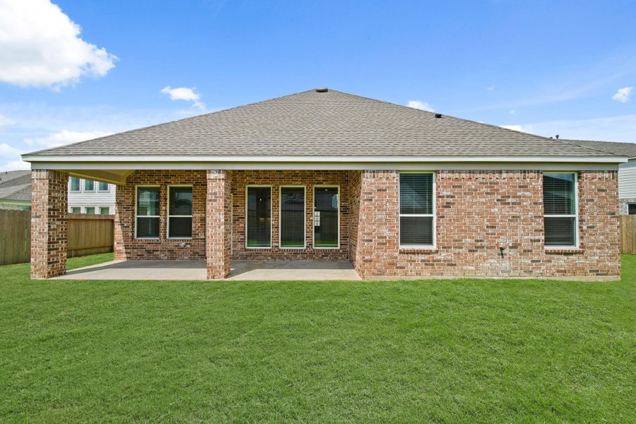 Front exterior of a new home in Beacon Hill, Waller, TX, highlighting curb appeal (Image 21). Front exterior of a new home in Beacon Hill, Waller, TX, highlighting curb appeal (Image 21).