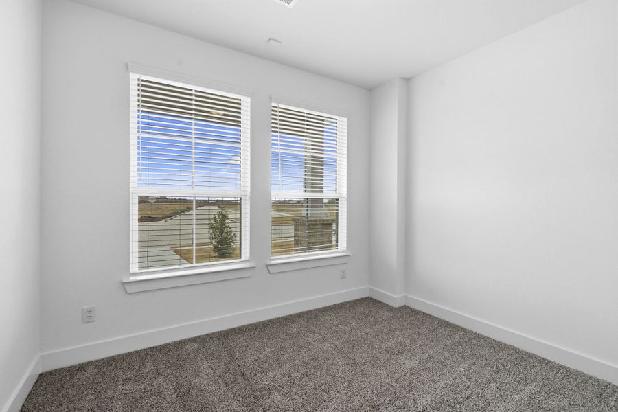 Spacious, unfurnished interior of a new home in Meridiana, Manvel (Image 13).