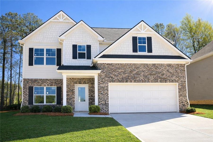 Front exterior of a new home in The Hills at Cedar Creek, Winder, GA, highlighting curb appeal (Image 1). Front exterior of a new home in The Hills at Cedar Creek, Winder, GA, highlighting curb appeal (Image 1).