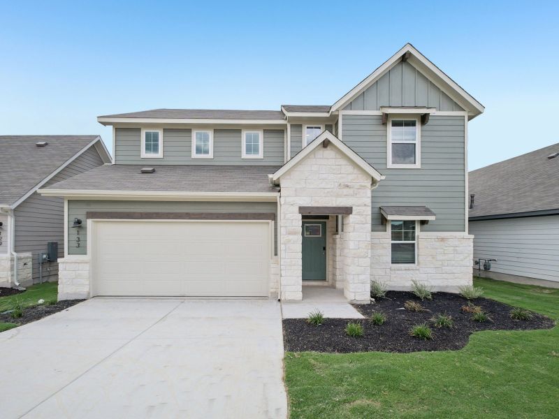 Front exterior of a new home in Riverbend at Double Eagle - Boulevard Collection, Cedar Creek, TX, highlighting curb appeal (Image 1). Front exterior of a new home in Riverbend at Double Eagle - Boulevard Collection, Cedar Creek, TX, highlighting curb appeal (Image 1).
