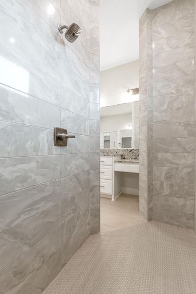 Bathroom with vanity and walk in shower
