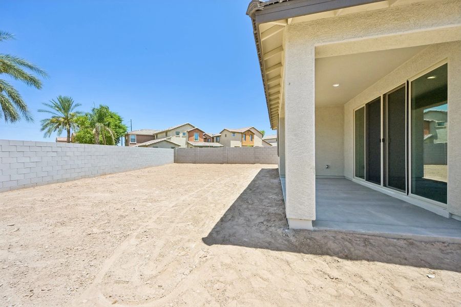 Covered patio and backyard Covered patio and backyard