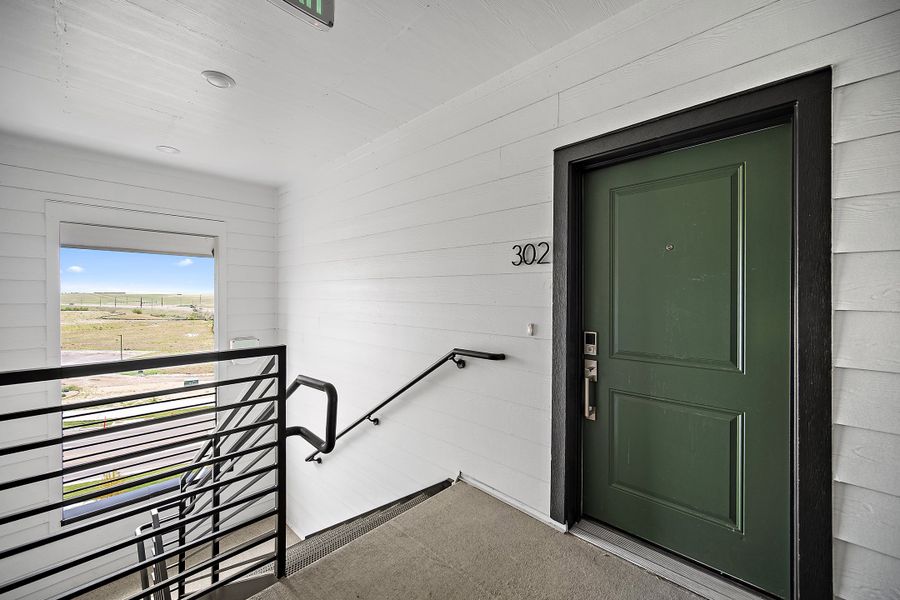 Exterior details and patio area of a home in Lyric at RidgeGate Condos, Lone Tree (Image 23).