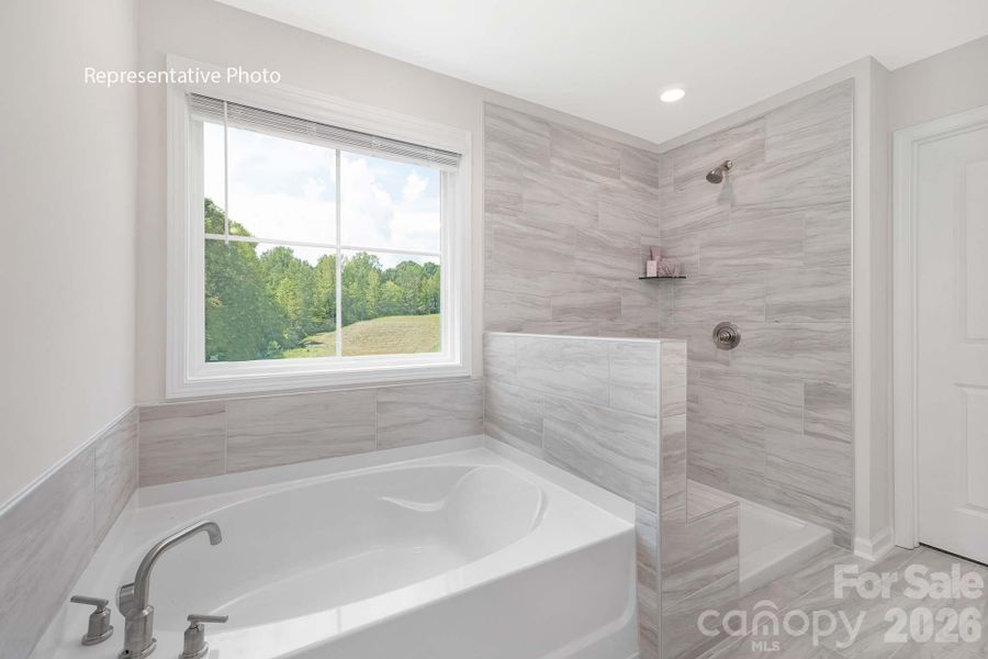 Furnished interior view inside a new home in Sanctuary at Southgate, Indian Trail (Image 13).