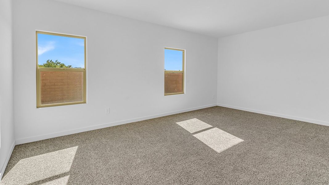Representative unfurnished interior of a home built from the Harris by D.R. Horton in The Oasis at Rocking K, Vail (Image 34).