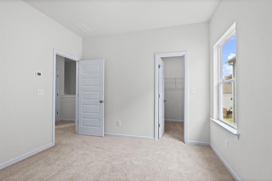 The Dove- Bedroom 3. Home under construction, photo used for illustrative purposes only, colors and options will vary.