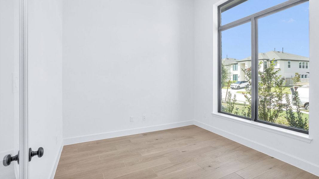 Spacious, unfurnished interior of a new home in Bridgeland, Cypress (Image 12).