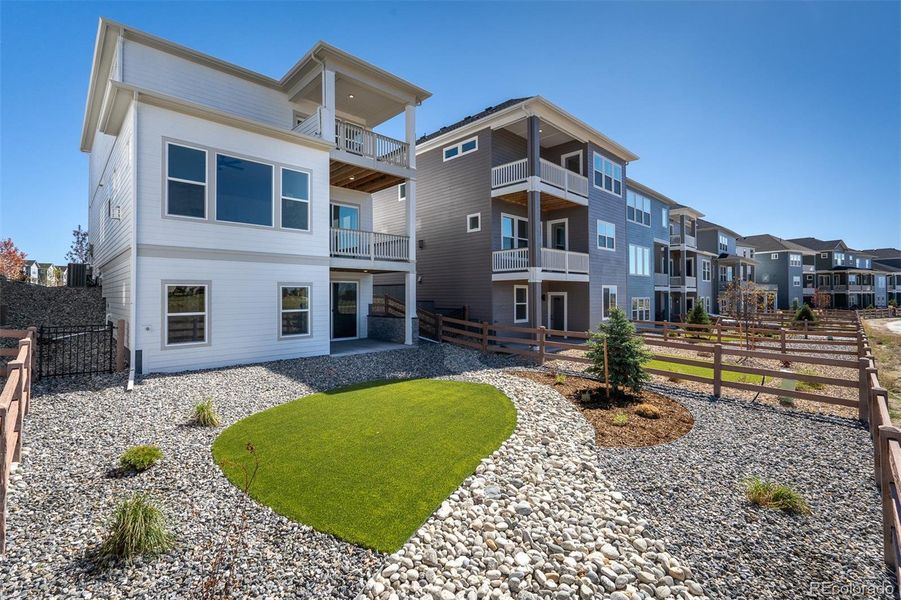 Exterior details and patio area of a home in Revel Crossing at Wolf Ranch - The Panorama Collection, Colorado Springs (Image 3).