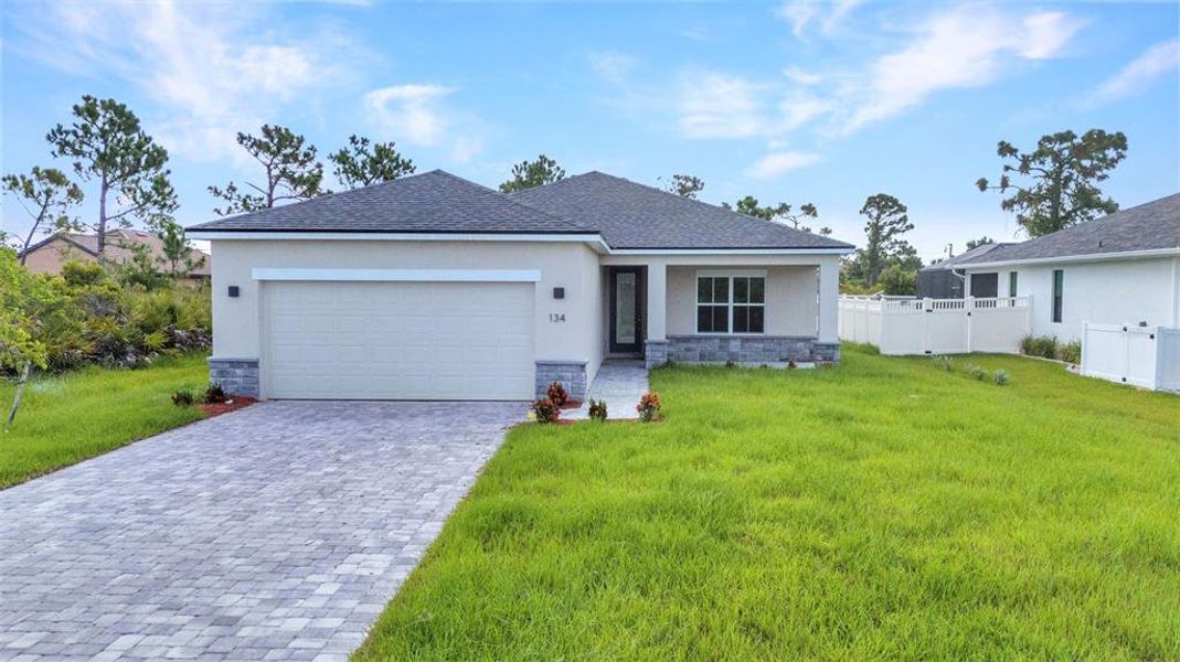 Front exterior of a new home in , Rotonda West, FL, highlighting curb appeal (Image 25). Front exterior of a new home in , Rotonda West, FL, highlighting curb appeal (Image 25).