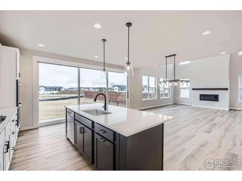 Furnished interior view inside a new home in RainDance, Windsor (Image 6).