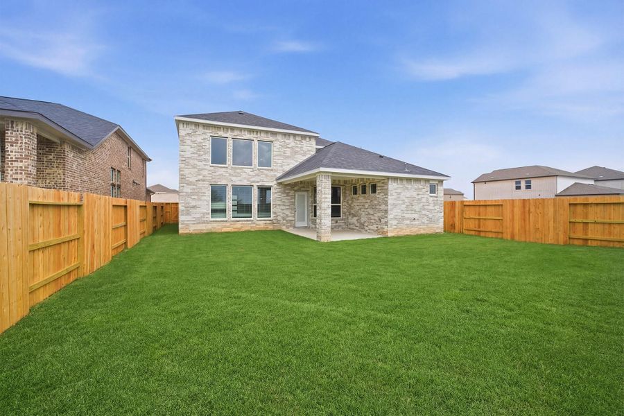 Exterior details and patio area of a home in Sunterra Lakes, Brookshire (Image 28). Exterior details and patio area of a home in Sunterra Lakes, Brookshire (Image 28).