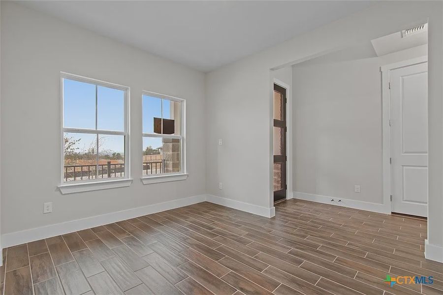 Spacious, unfurnished interior of a new home in Lakeside at Tessera on Lake Travis, Lago Vista (Image 19). Spacious, unfurnished interior of a new home in Lakeside at Tessera on Lake Travis, Lago Vista (Image 19).