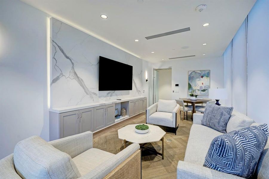 Enjoy herringbone floors, striking stone, comfortable furnishings and a large-screen television in the resident's lounge.