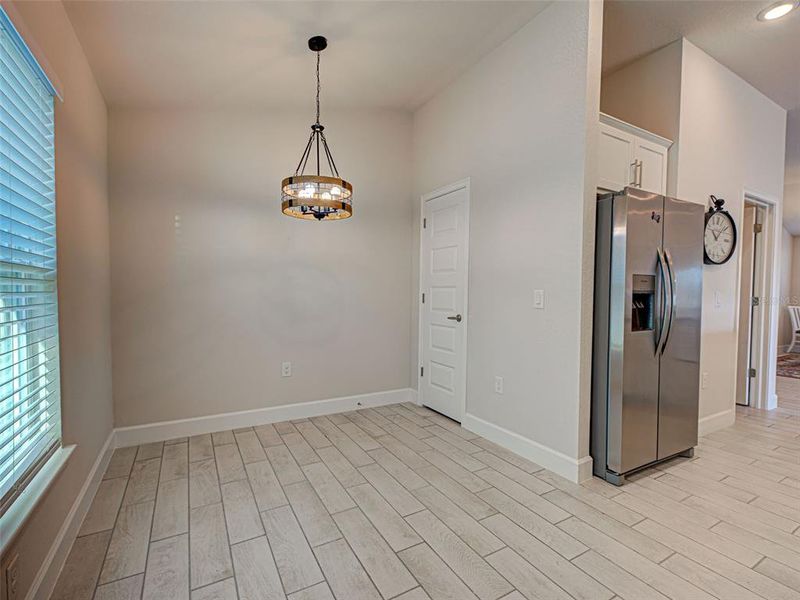 Spacious, unfurnished interior of a new home in Watercress Cove, North Port (Image 24).