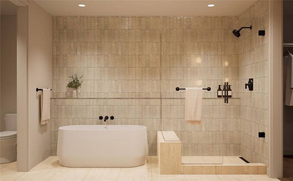 Primary bathroom in the Trailhead palette, featuring a walk-in shower, freestanding tub, tiled walls, travertine flooring, and recessed lighting. A serene, spa-inspired retreat designed to promote relaxation and comfort. Primary bathroom in the Trailhead palette, featuring a walk-in shower, freestanding tub, tiled walls, travertine flooring, and recessed lighting. A serene, spa-inspired retreat designed to promote relaxation and comfort.