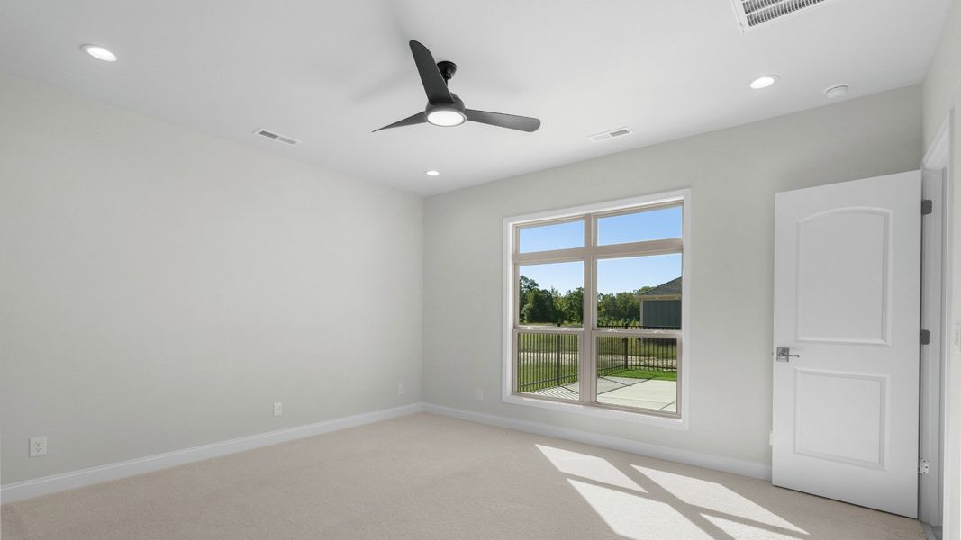 Spacious, unfurnished interior of a new home in Courtyards by Carrell, Ocean Isle Beach (Image 14). Spacious, unfurnished interior of a new home in Courtyards by Carrell, Ocean Isle Beach (Image 14).