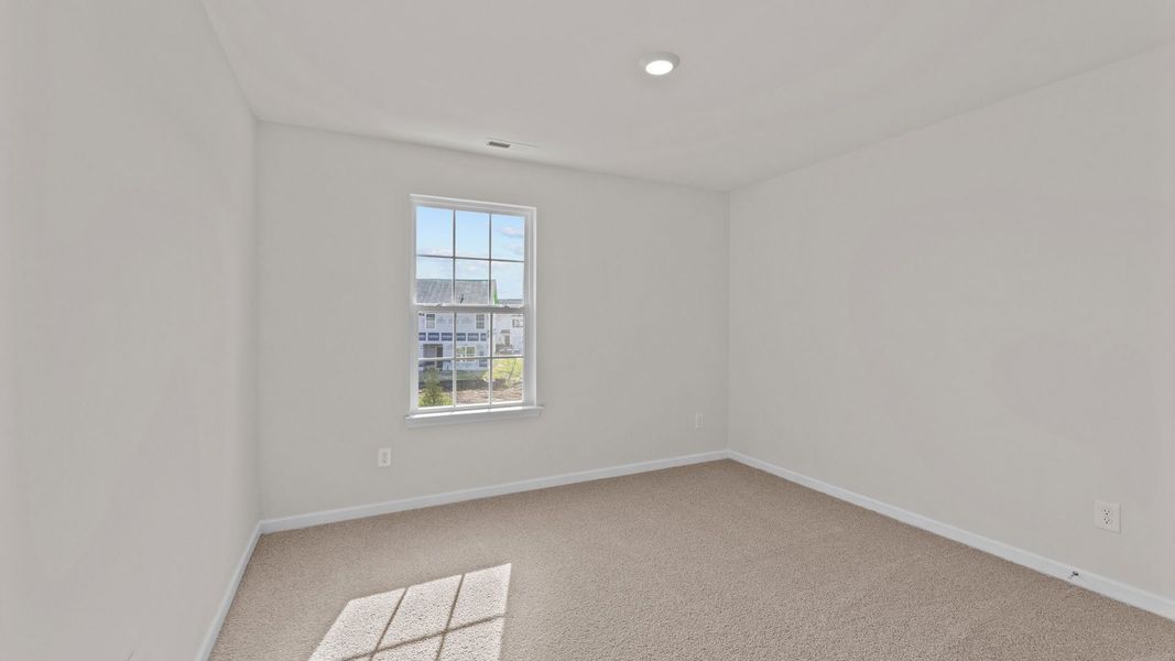 Spacious, unfurnished interior of a new home in Ridgewood Farms, Winterville (Image 14).