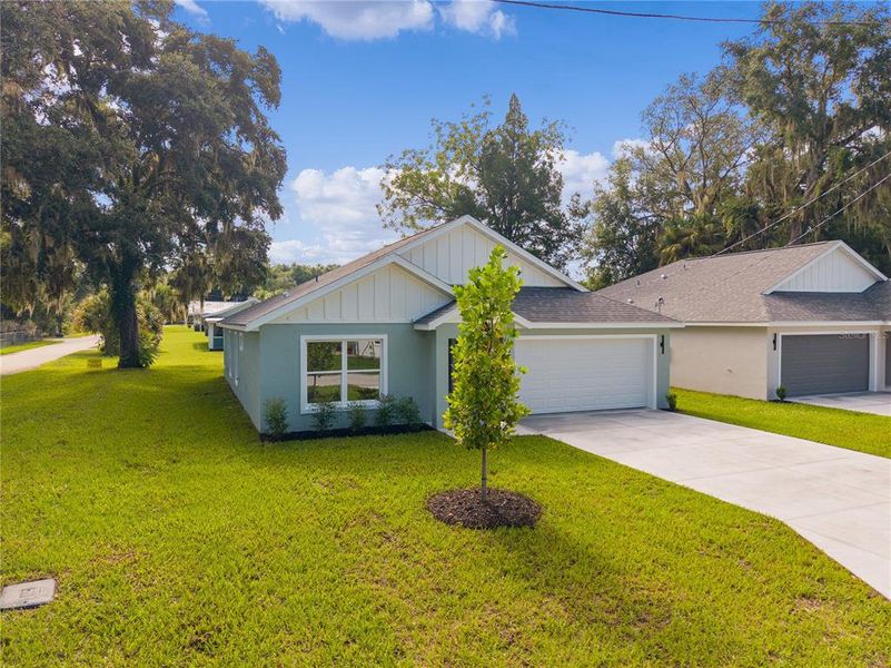 Front exterior of a new home in , Wildwood, FL, highlighting curb appeal (Image 2). Front exterior of a new home in , Wildwood, FL, highlighting curb appeal (Image 2).