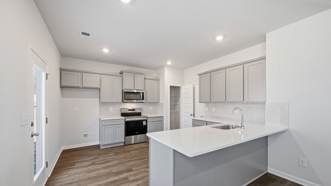 Furnished interior view inside a new home in Willowbrook, Winder (Image 6).