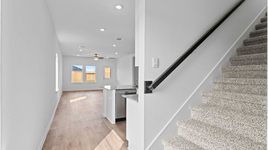Representative unfurnished interior of a home built from the Hanna by D.R. Horton in Caldwell Crossing, Iowa Colony (Image 17).