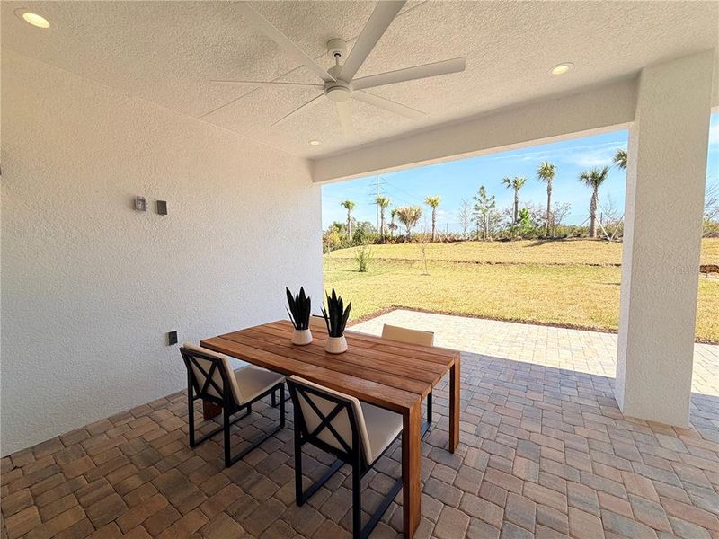 Exterior details and patio area of a home in Valencia Ridge, Wesley Chapel (Image 23).