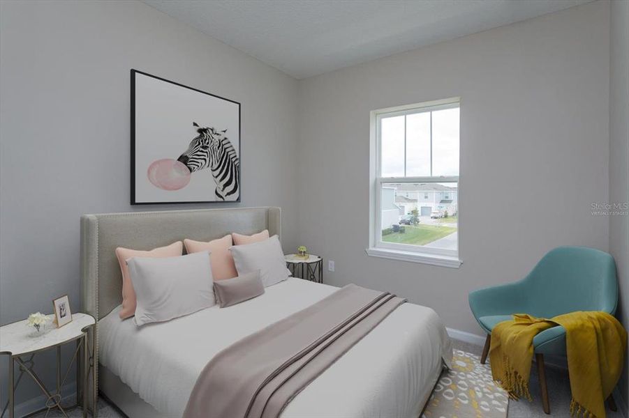 Furnished interior view inside a new home in Serenade at Ovation, Winter Garden (Image 8).