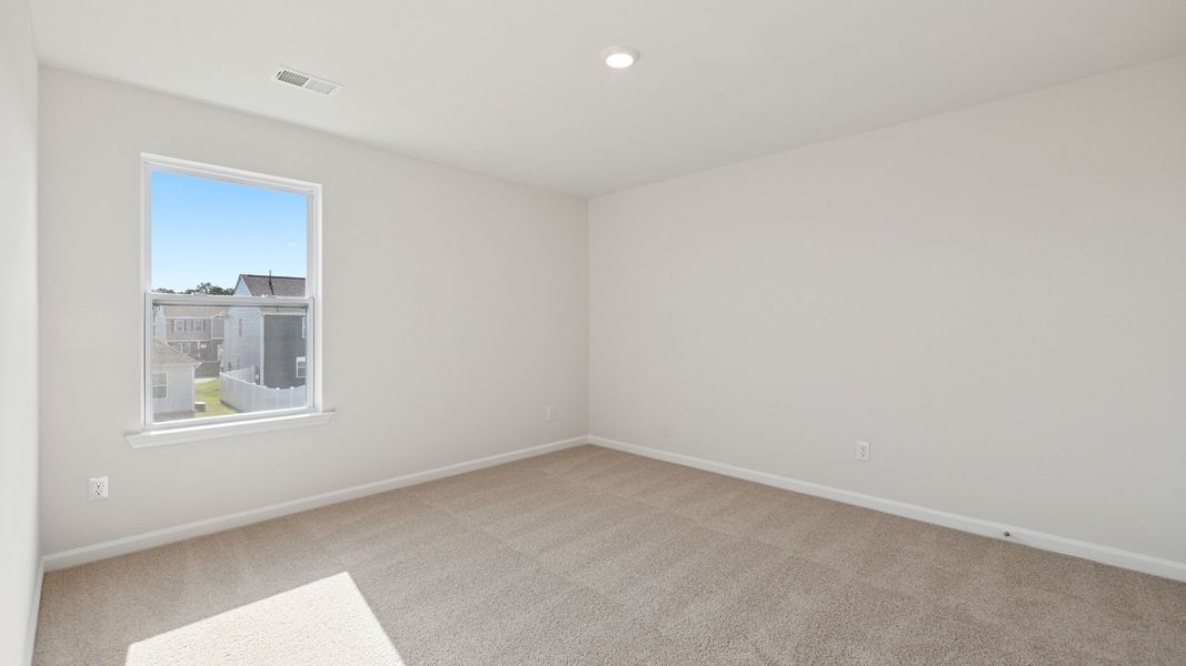 Spacious, unfurnished interior of a new home in Durbin Meadows Traditions, Fountain Inn (Image 20).