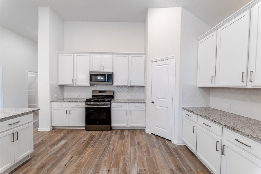 Furnished interior view inside a new home in Harvest Pointe, Needville (Image 8).