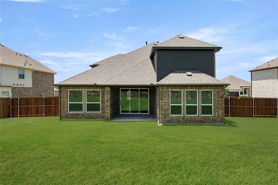 Exterior details and patio area of a home in Grayhawk Addition, Forney (Image 3).