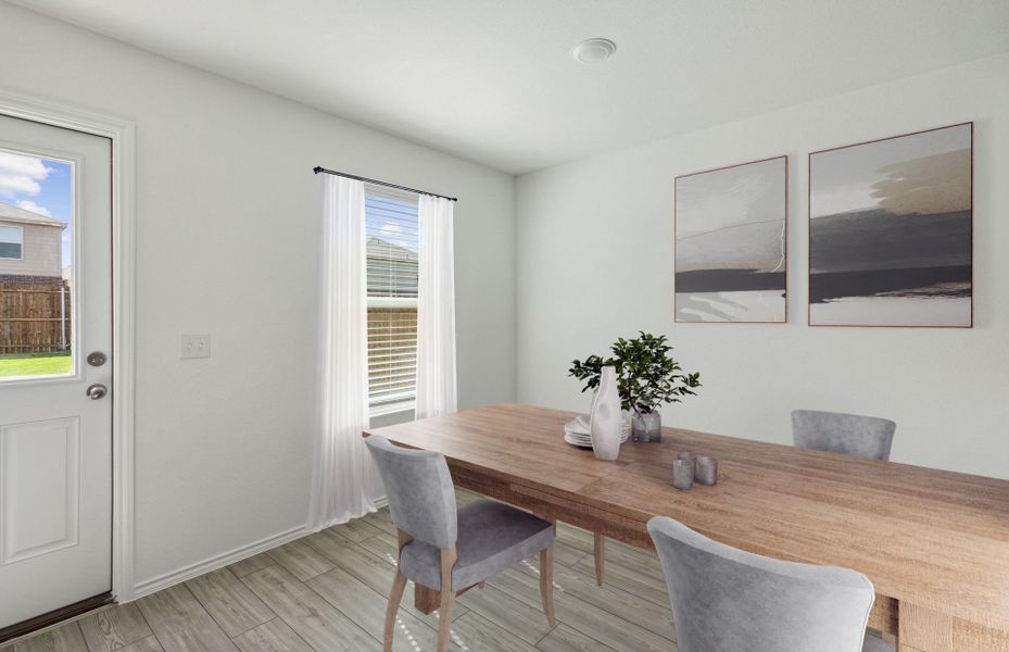 Airy dining area off of kitchen