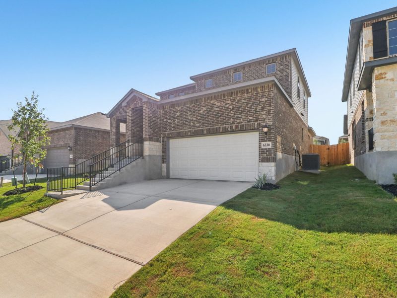 Front exterior of the Matador floorplan at a Meritage Homes community. Front exterior of the Matador floorplan at a Meritage Homes community.
