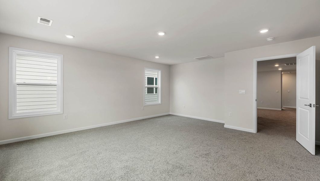 Spacious, unfurnished interior of a new home in Adams Glen, Greenville (Image 29).