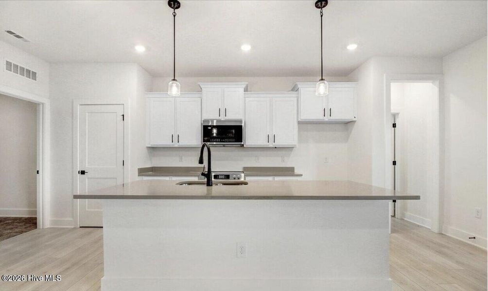 Furnished interior view inside a new home in Wood Creek, Leland (Image 4). Furnished interior view inside a new home in Wood Creek, Leland (Image 4).