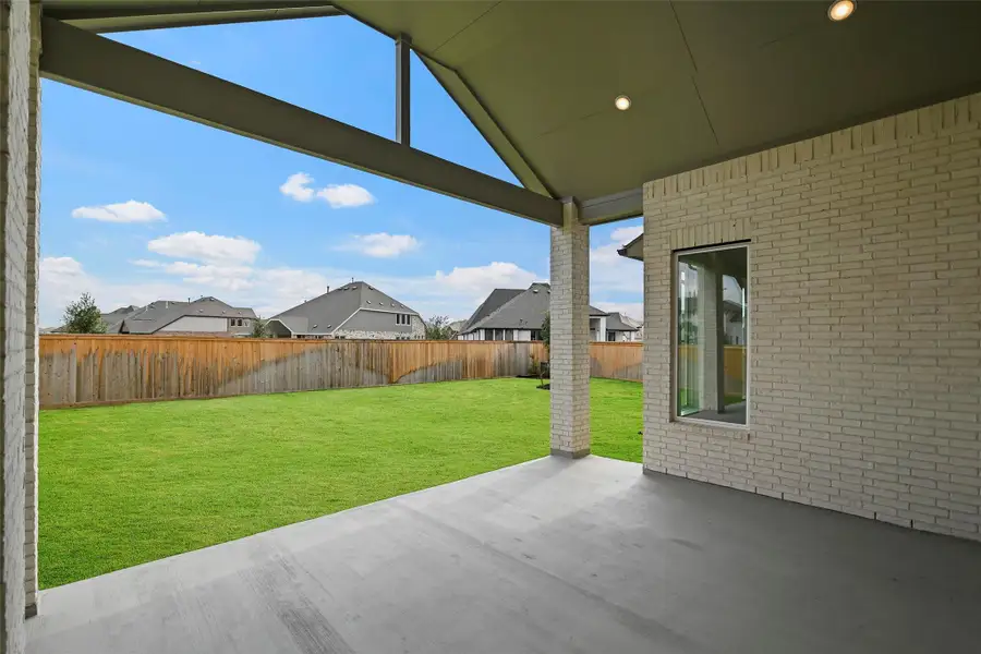 Exterior details and patio area of a home in Bridgeland 80′, Cypress (Image 2).