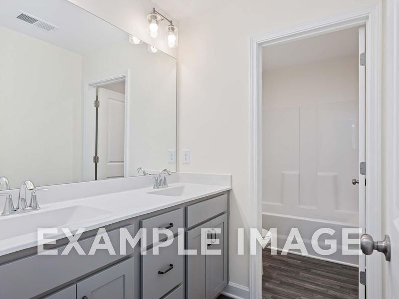 Furnished interior view inside a new home in Woodland Crossing, Zebulon (Image 7).