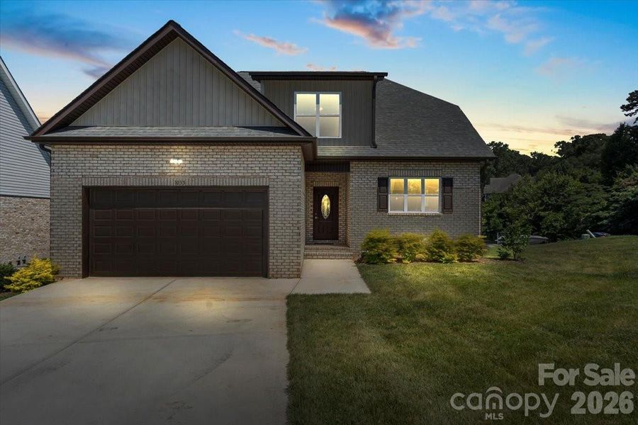 Front exterior of a new home in , Hickory, NC, highlighting curb appeal (Image 21).
