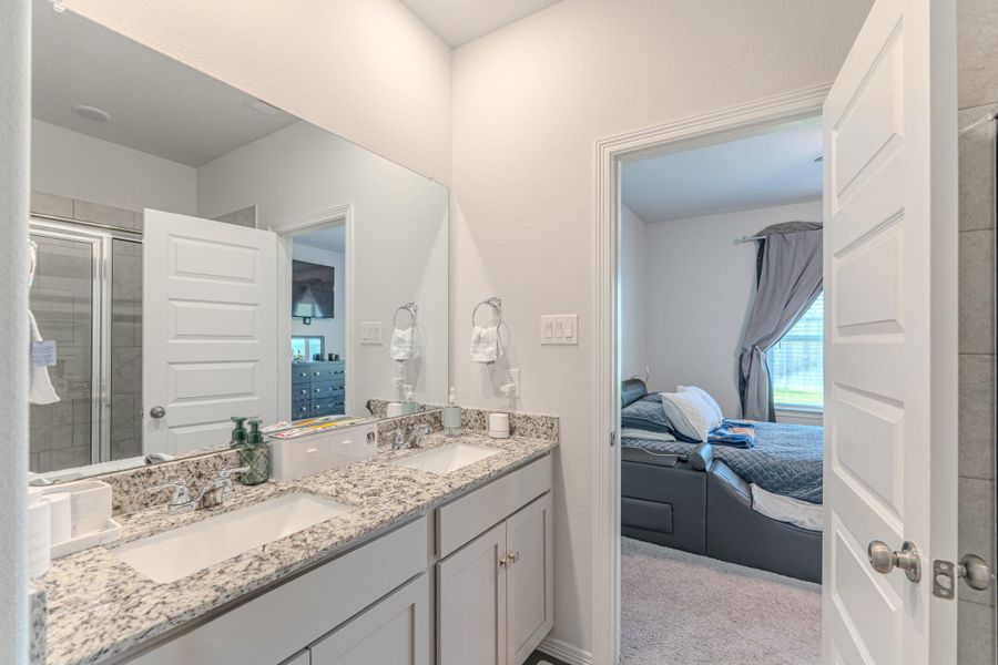 Furnished interior view inside a new home in Lonestar Collection at Aurora, Katy (Image 17). Furnished interior view inside a new home in Lonestar Collection at Aurora, Katy (Image 17).