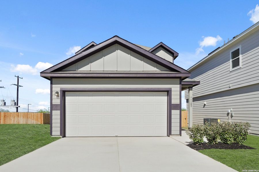 Front exterior of a new home in Katzer Ranch, Converse, TX, highlighting curb appeal (Image 1). Front exterior of a new home in Katzer Ranch, Converse, TX, highlighting curb appeal (Image 1).