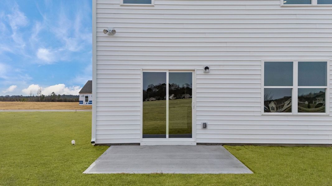 Exterior details and patio area of a home in Ridgewood Farms, Winterville (Image 4). Exterior details and patio area of a home in Ridgewood Farms, Winterville (Image 4).