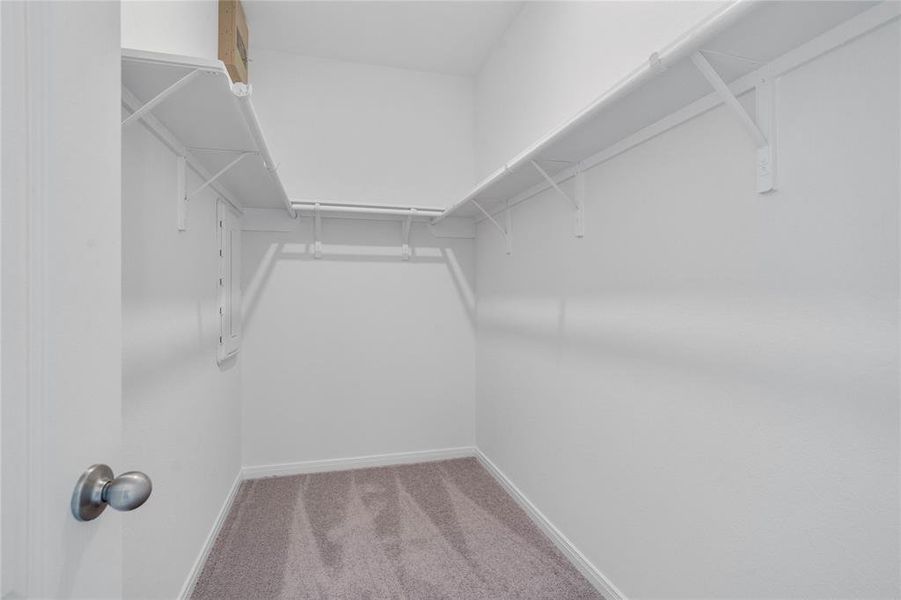 Look at this immaculate closet! With high shelving, multiple rows to hang clothing, you are sure to have enough room for all your belongings!