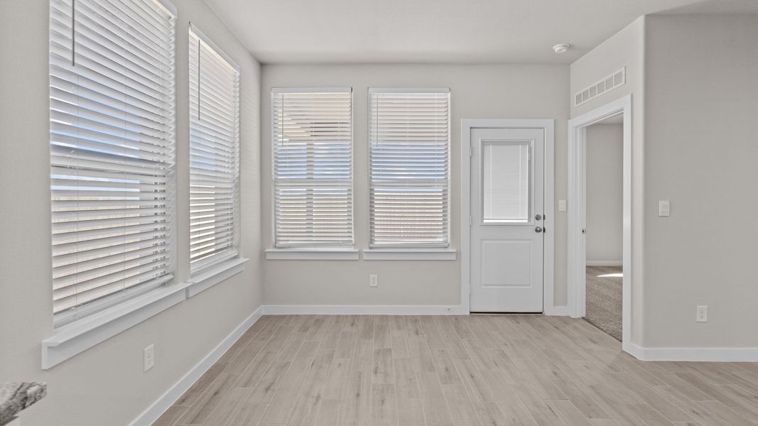 Representative unfurnished interior of a home built from the PORTALES by D.R. Horton in Northwest Passage, Midland (Image 10). Representative unfurnished interior of a home built from the PORTALES by D.R. Horton in Northwest Passage, Midland (Image 10).