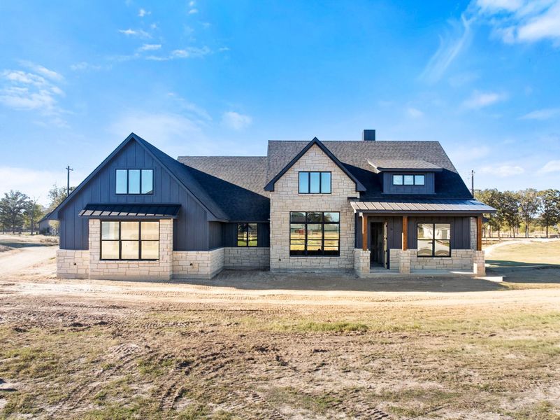 Front exterior of a new home in , Bryan, TX, highlighting curb appeal (Image 1). Front exterior of a new home in , Bryan, TX, highlighting curb appeal (Image 1).